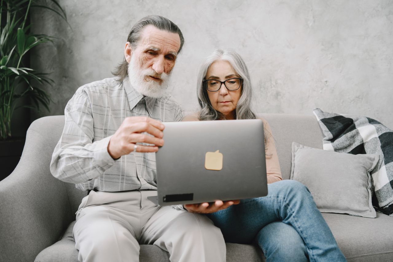 Retirees reviewing guaranteed lifetime income options from a fixed indexed annuity#1.6